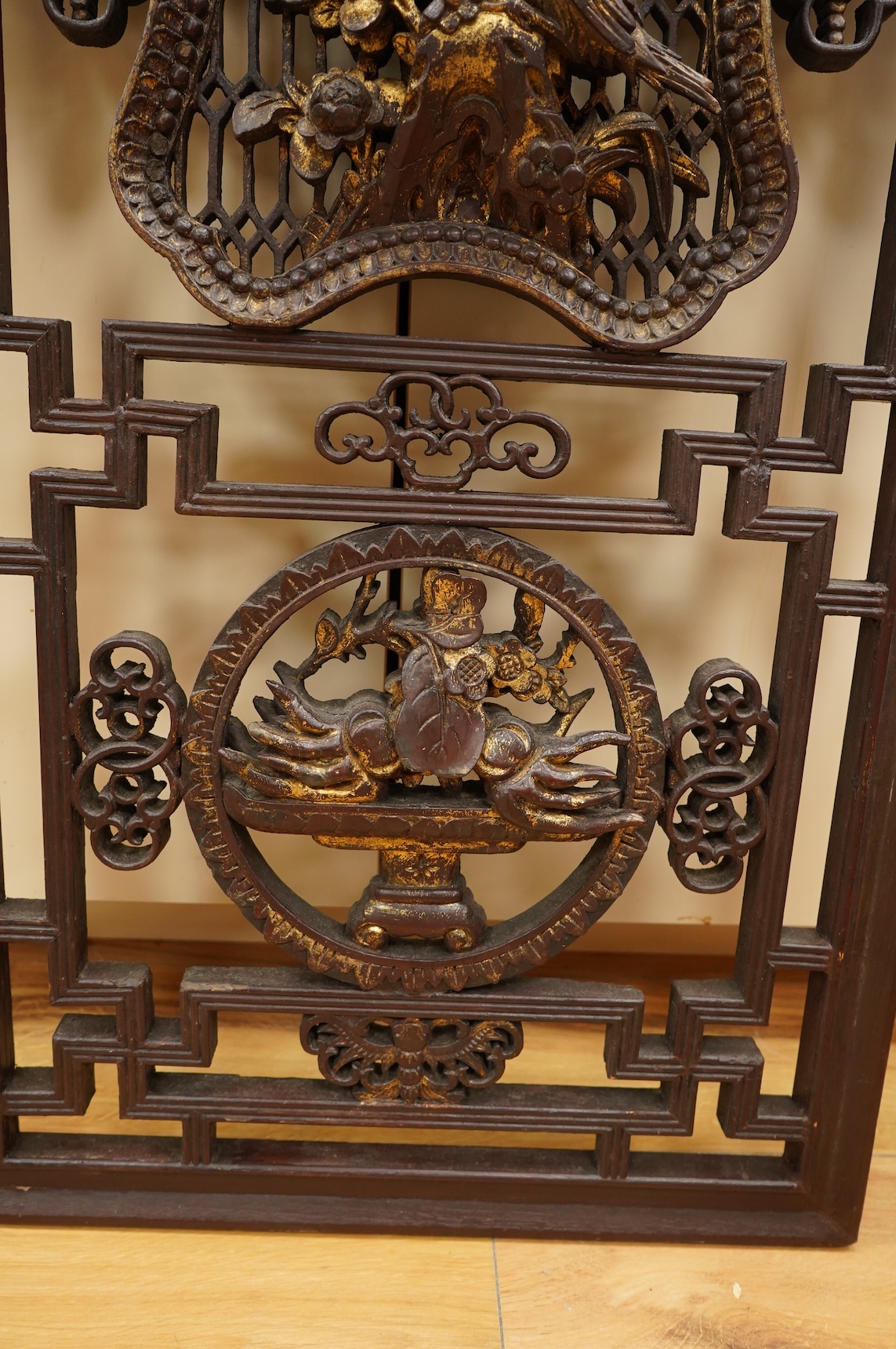 A 19th century Chinese gilt lacquered wood panel, 128cm high